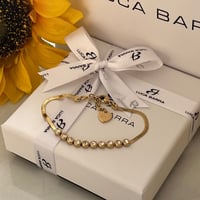 اسواره ذهبي بالأحجار البيضاء من براند LUCA BARRA