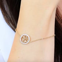 اسواره ذهبيه بالزيركون الأبيض من براند Guess