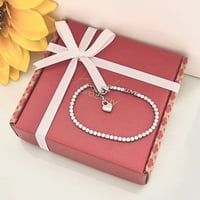 اسوارة الحب و الزيركون الأبيض من براند Brosway