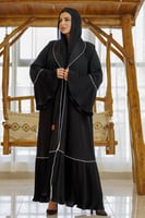 عباية كلوش بتحديد ابيض مع كسرات من الأسفل والكم