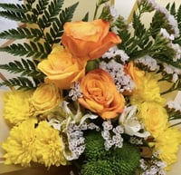 باقة ورد صن شاين مع شوكولاتة باتشي او فيريرو