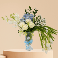 براءة تتفت ورد التوليب والاوركيد فازه ورد