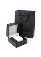 A watch with accessories, box, and bag