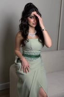 فستان سهرة أخضر فاتح مطرز بحزام كريستال لامع