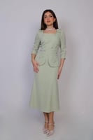 فستان نسائي أنيق باللون الفستقي المميز بتصميم راقٍ...