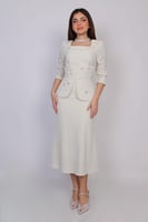 فستان نسائي أنيق باللون الفستقي المميز بتصميم راقٍ...