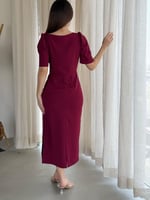 فستان مصمم بقصة ملفوفة