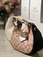 حقيبة جوني من كوتش