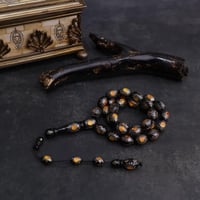 سبحة اليسر وكسر الكهرمان