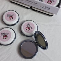 توزيعات مرآة جيب لـ 12 مراية