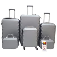 طقم حقائب سفر فايبر 6 قطع بجوانب مدببة لون فضي