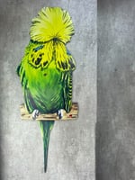 ساعة حائط علي شكل طائر