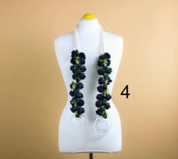 عقد زهرة تخرج بالاسم