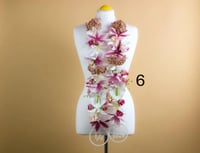 عقد زهرة تخرج بالاسم