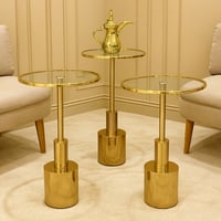 طقم طاولات زجاجية دائرية بقاعدة معدنية فاخرة – 3 أ...