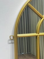 مرآة جدارية بإطار معدني ذهبي