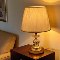 ابجورة طاولة فاخر بقاعدة كريستالية ذهبية