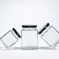 علب زجاجي مربع جمله فضي واسود