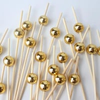 تغريسات خشب لولو ذهبي