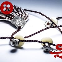 تركيبات عظم من ازراري لاناقة الثوب السعودي