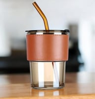 مجموعة 12 من أكوب زجاجية بتصميم انيق بغطاء و تلبسه...