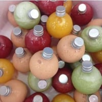 مجموعة 12 من علب العصير الشفافة بتصميم دائري