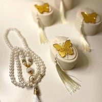 مجموعة 12 من علب التوزيعات معبئة بمسبحة لولؤ منسق...