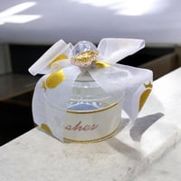 مجموعة (12) من علب توزيعات انيقة بتصميم دائري بالل...