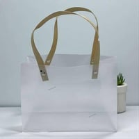 مجموعة (12) من اكياس توزيعات انيقة باللون الابيض م...