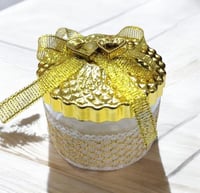 مجموعة (12) من علب توزيعات انيقة بتصميم دائري بالل...