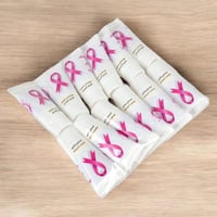 توزيعات التوعية بسرطان الثدي 12 حبة من كريم الجسم...