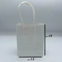 مجموعة (12) من اكياس توزيعات ورقية باللون الابيض