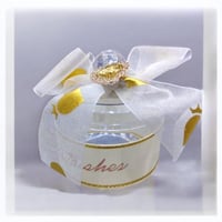 مجموعة (12) من علب توزيعات انيقة بتصميم دائري بالل...