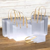 مجموعة (12) من اكياس توزيعات شفافة بتصميم انيق