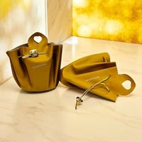 مجموعة (12) من اكياس لتنسيق الهدايا والتوزيعات بطر...