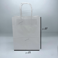 مجموعة (12) من اكياس توزيعات ورقية باللون الابيض