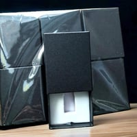 مجموعة 12 علب كرتوني لربع تولة مسك مستطيل الشكل لو...