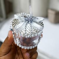 مجموعة (12) من علب توزيعات انيقة بتصميم دائري بالل...