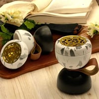 مجموعة 12 من المباخر بتصميم انيق لون رمادي وأبيض و...