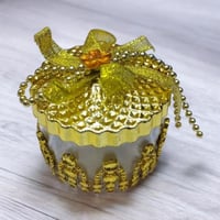 مجموعة (12) من علب توزيعات انيقة بتصميم دائري بالل...