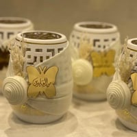 توزيعات من 12 قطعة من المباخر المنسقة بالتنسيق الي...