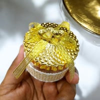 مجموعة (12) من علب توزيعات انيقة بتصميم دائري بالل...