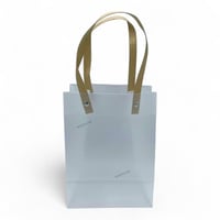 مجموعة (12) من اكياس توزيعات انيقة باللون الابيض م...