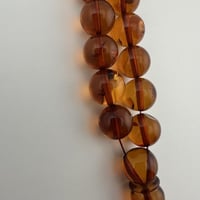 سبحة كهرمان كاريبي طبيعي شفاف