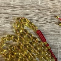 مسباح كهرمان بولندي كالينجرادي مع شرابة حمراء أنيق...