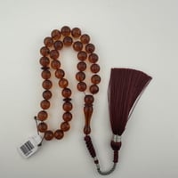 سبحة كهرمان كاريبي طبيعي شفاف