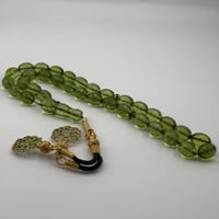 مسباح كهرمان كاريبي مع طربزونتين فضة عيار 1000 مع...