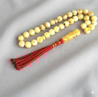 مسباح كهرمان طبيعي شوائب