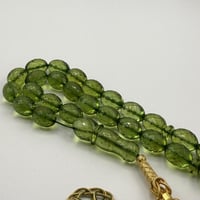 مسباح كهرمان كاريبي مع طربزونتين فضة عيار 1000 مع...