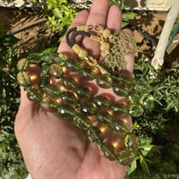 مسباح كهرمان كاريبي مع طربزونتين فضة عيار 1000 مع...